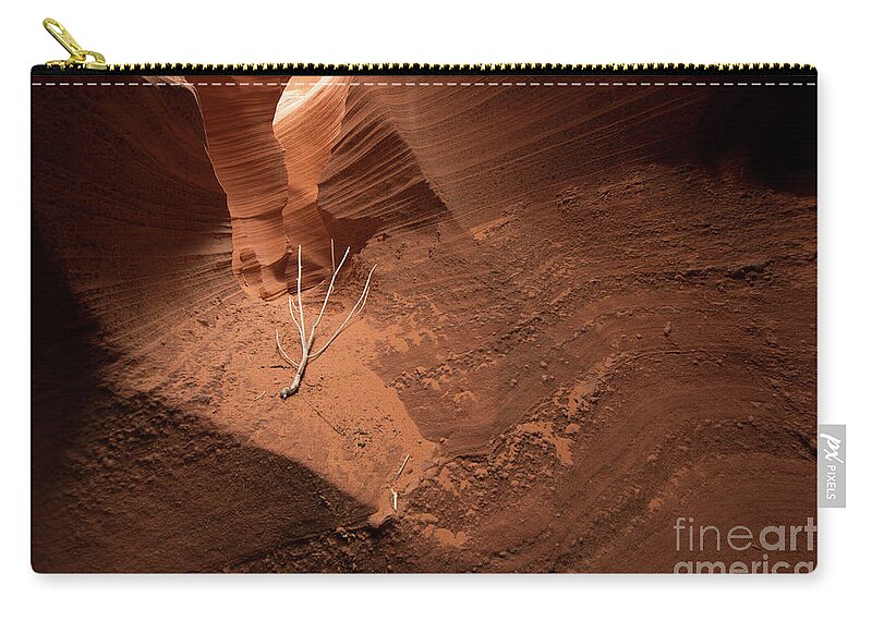  Lone Zip Pouch featuring the photograph Deep Inside Antelope Canyon by Jim DeLillo