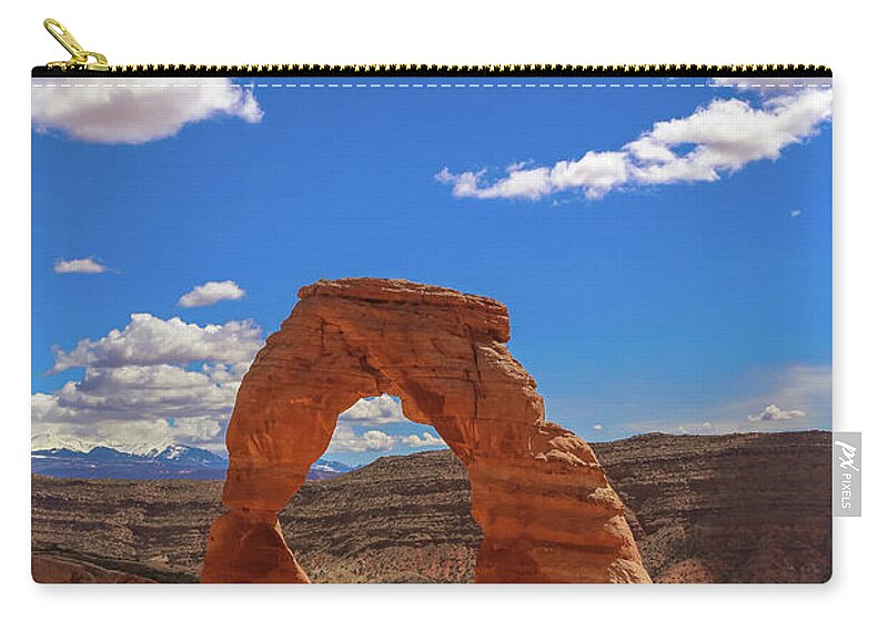 Usa Zip Pouch featuring the photograph Delicate arch by Alberto Zanoni