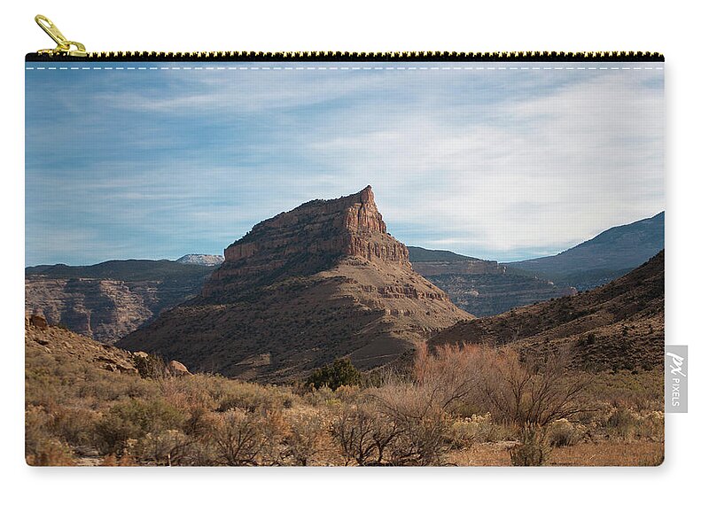 Desert Zip Pouch featuring the photograph Desert Butte by Julia McHugh