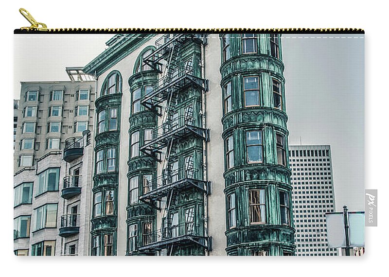 Buildings Carry-all Pouch featuring the photograph Dez 2016. San Francisco, USA - Old copper-green Columbus tower o by Amanda Mohler