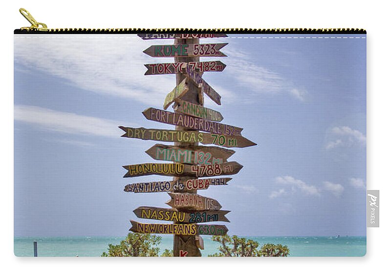 Signpost Zip Pouch featuring the photograph Distance From Key West by Bob Slitzan