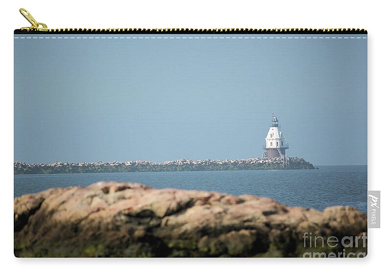 Coastal Zip Pouch featuring the photograph Distant Lighthouse by Karol Livote