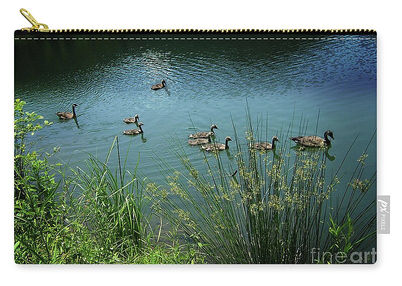 Ducks Zip Pouch featuring the photograph Do not Drift Away by Sandra Clark