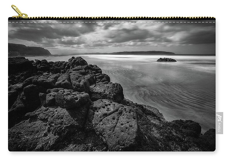 Downhill Zip Pouch featuring the photograph Downhill Rocks by Nigel R Bell