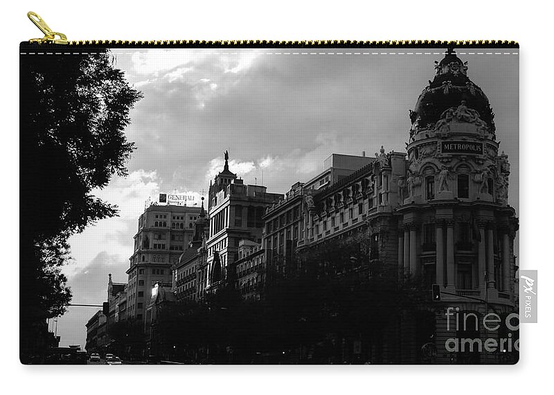 Madrid Zip Pouch featuring the photograph Dramatic sky over Madrid / Spain by Karina Plachetka