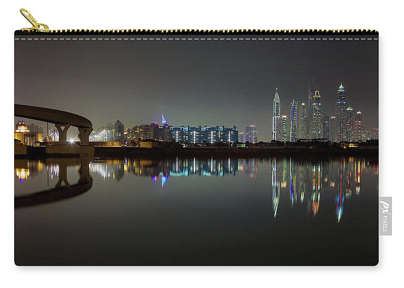 Dubai Carry-all Pouch featuring the photograph Dubai city skyline night time reflection by Andy Myatt