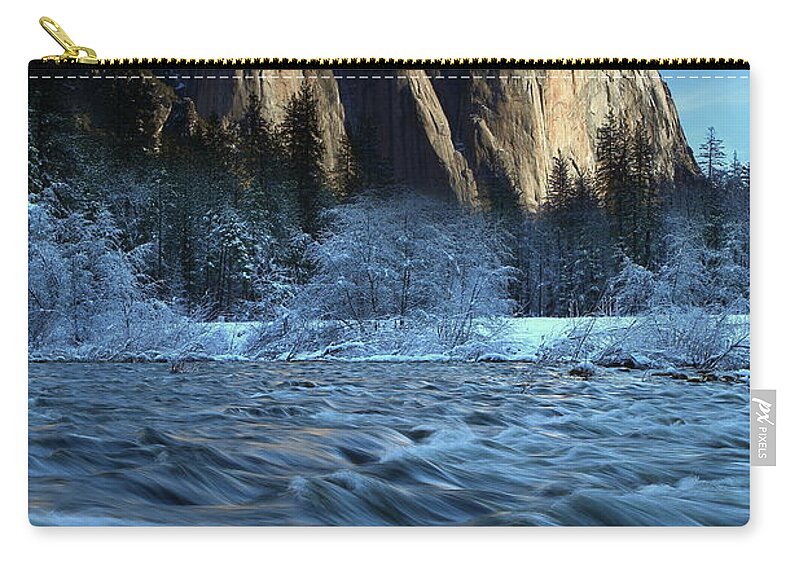 El Zip Pouch featuring the photograph Early morning light on El Capitan during winter at Yosemite National Park by Jetson Nguyen