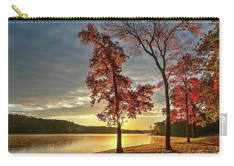 Autumn Zip Pouch featuring the photograph East Texas Autumn Sunrise At The Lake by Todd Aaron