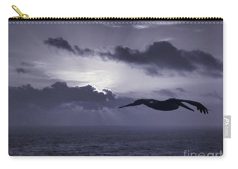 Sunrise Zip Pouch featuring the photograph Pelican At Sunrise by Jeff Breiman