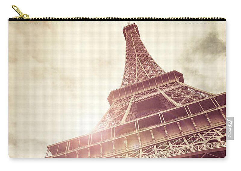 Eiffel Zip Pouch featuring the photograph Eiffel Tower in sunlight by Jane Rix