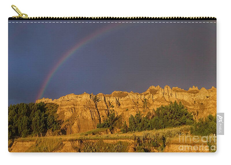 Badlands Zip Pouch featuring the photograph End of the Rainbow by Karen Jorstad