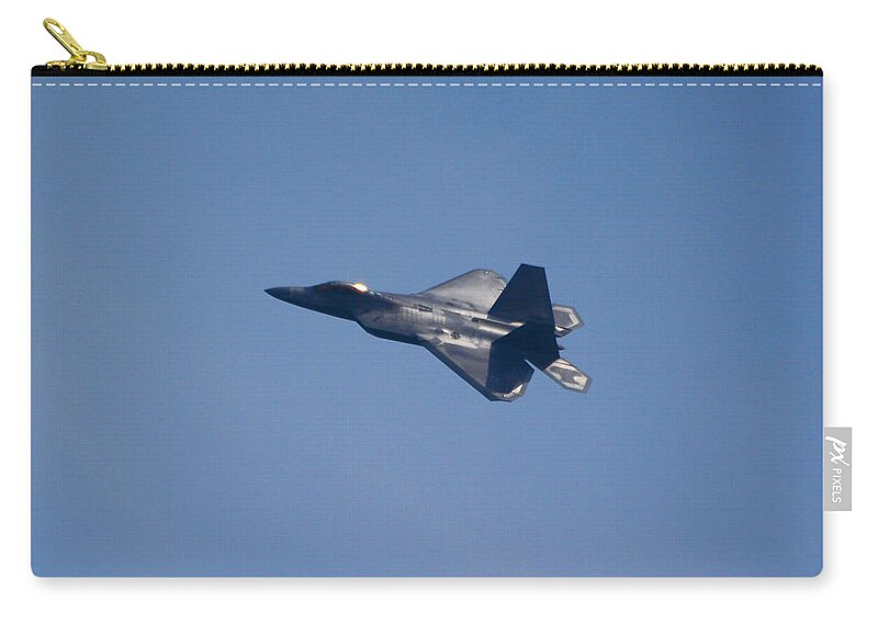 F-22 Zip Pouch featuring the photograph F-22 Raptor by Raymond Salani III