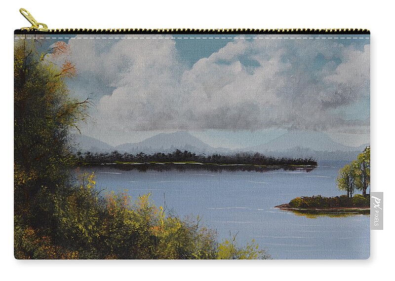 A Landscape Of A Large Blue Lake With A Bright Sky Containing Clouds. There Are Distant Mountains And Two Inlets On The Lake. In The Fore Ground Are Multi-colored Brushes With A Tree Containing Different Colored Leaves. Zip Pouch featuring the painting Fall Lake by Martin Schmidt