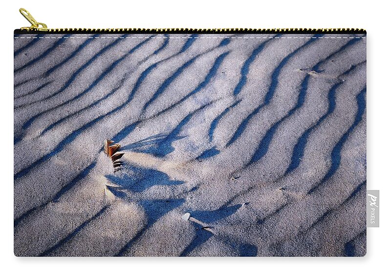 Sand Patterns Zip Pouch featuring the photograph Feather in Sand by Michelle Calkins