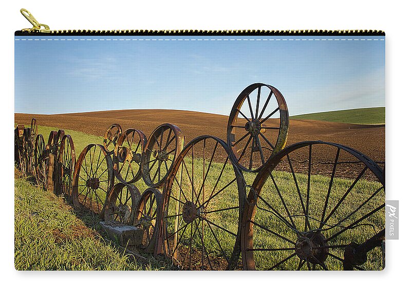 Palouse Carry-all Pouch featuring the photograph Fence of Wheels by Mary Lee Dereske