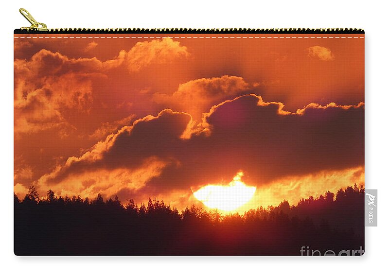 Sunset Zip Pouch featuring the photograph Fiery Sunset 1 by Charles Robinson
