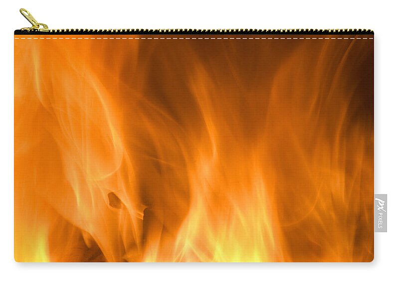 Fire Background Carry-all Pouch featuring the photograph Fire flames background by Michalakis Ppalis