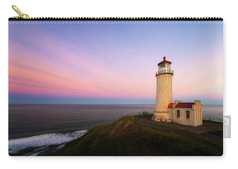 North Head Zip Pouch featuring the photograph First Light by Ryan Manuel