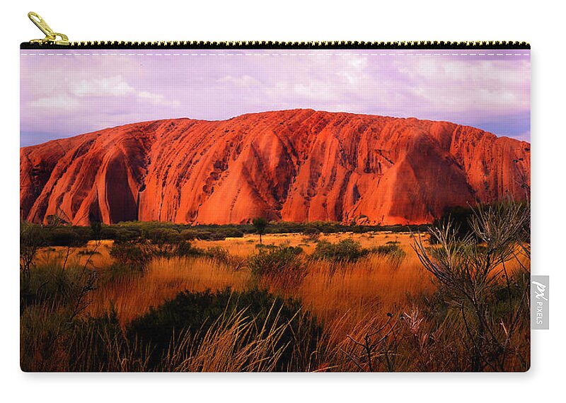 Raw And Untouched Northern Territory Series By Lexa Harpell Zip Pouch featuring the photograph First Light - Uluru, Australia by Lexa Harpell