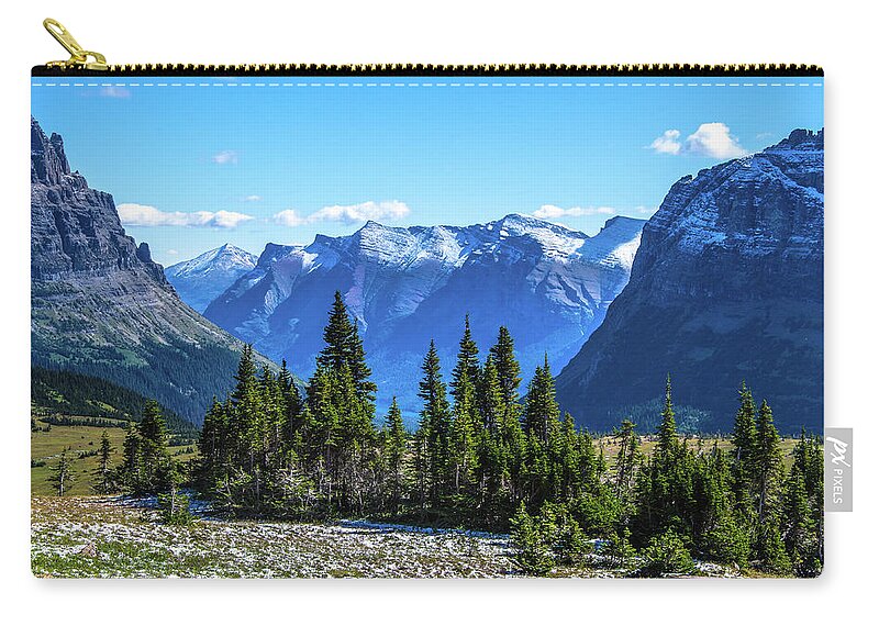 Alpine Zip Pouch featuring the photograph First Winter Snow In Glacier by Yeates Photography