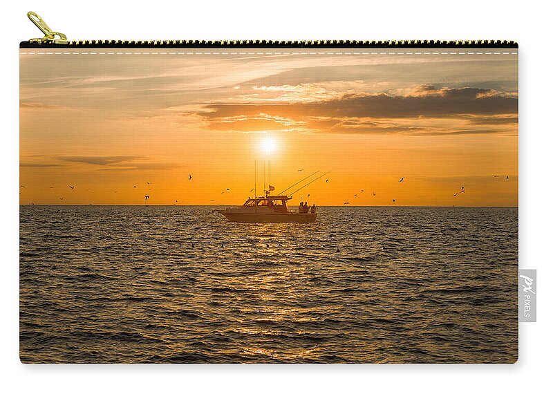 Fishing Zip Pouch featuring the photograph Fishing as the Sun Goes Down by Mark Rogers