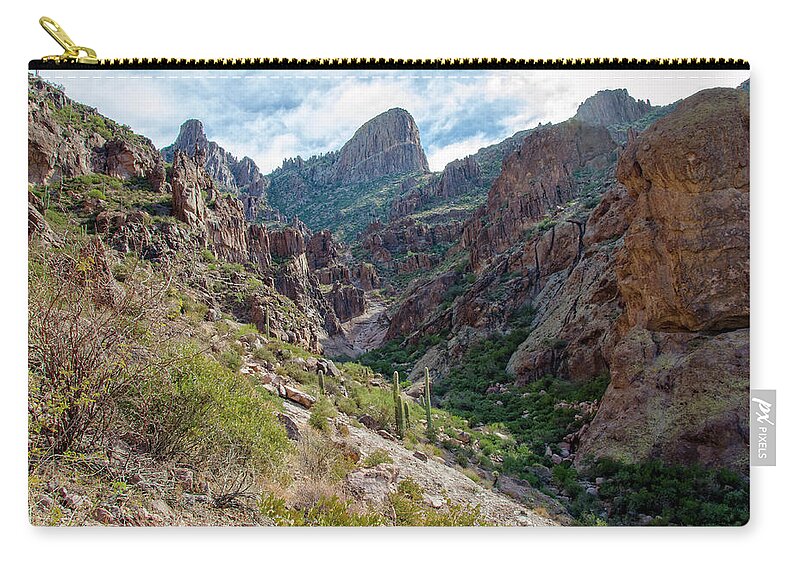 Arizona Zip Pouch featuring the photograph Flat Iron by Sandra Parlow