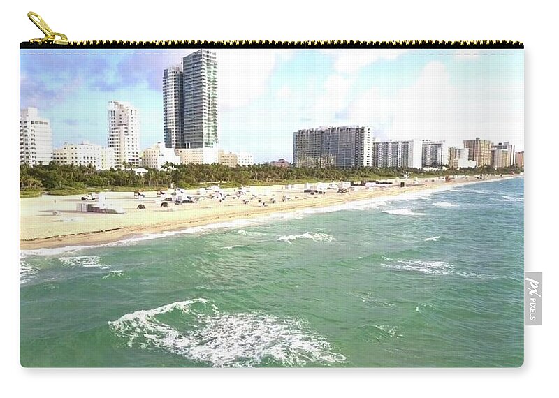 South Beach Zip Pouch featuring the photograph Floating by Michael Albright