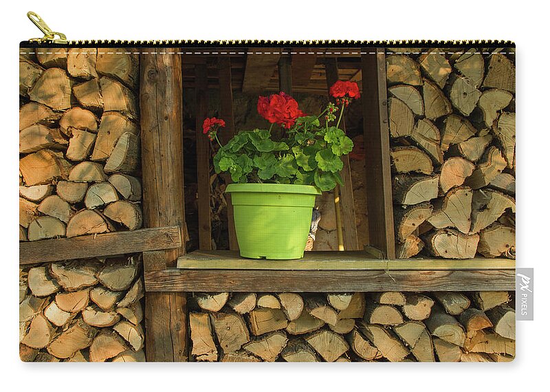 Woodshed Zip Pouch featuring the photograph Flowers on the woodshed window by Nicola Aristolao