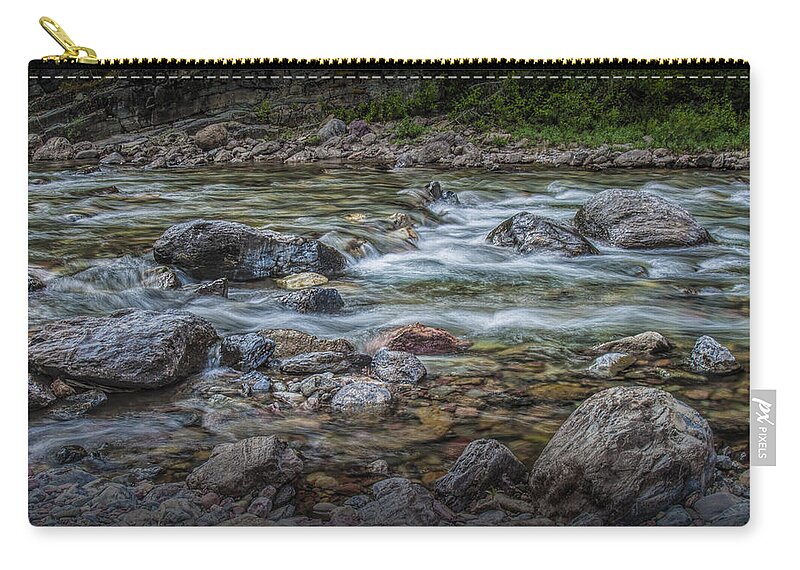 Stream Zip Pouch featuring the photograph Flowing Western Stream in Glacier National Park by Randall Nyhof
