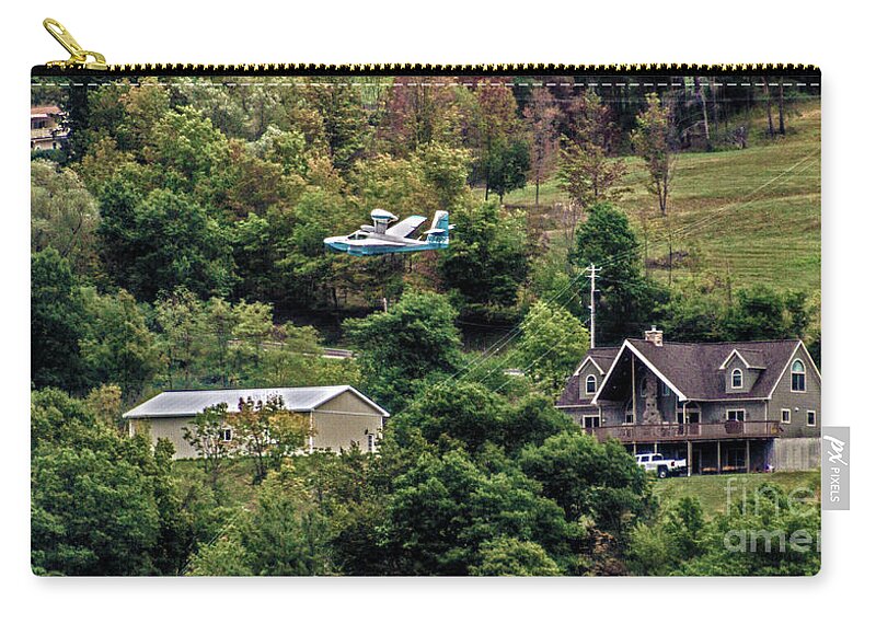 Fly By Zip Pouch featuring the photograph Fly By by William Norton