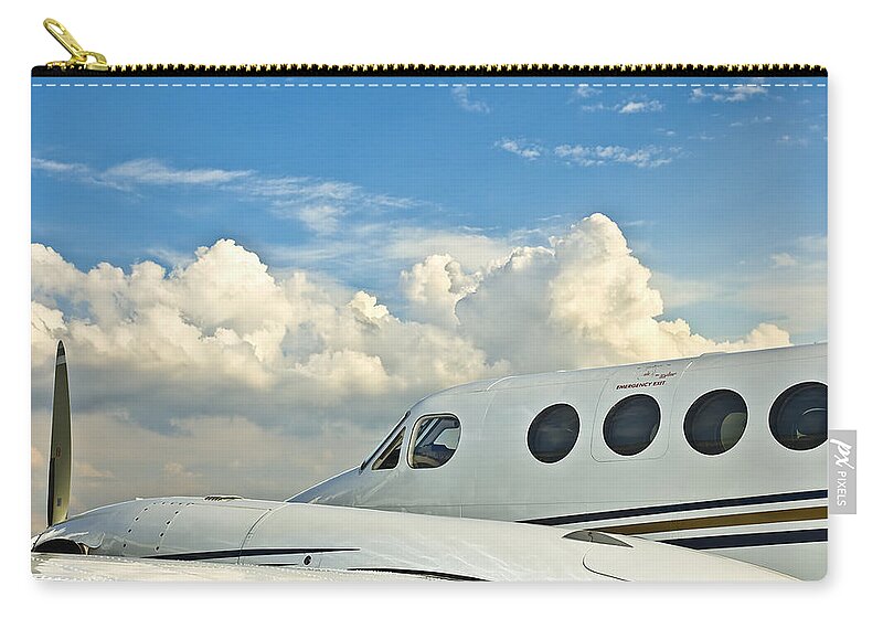 Airplane Zip Pouch featuring the photograph Flying Time by Carolyn Marshall
