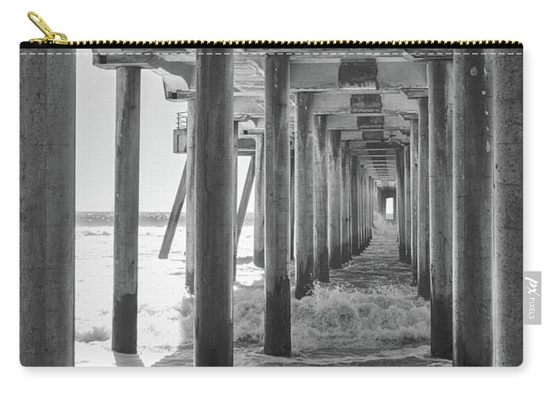Huntington Beach Zip Pouch featuring the photograph Follow The Lines Under Huntington Beach Pier by Ana V Ramirez