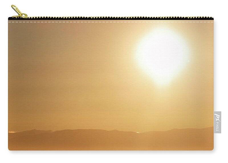 Follow Zip Pouch featuring the photograph Follow the Sun by Nicholas Blackwell