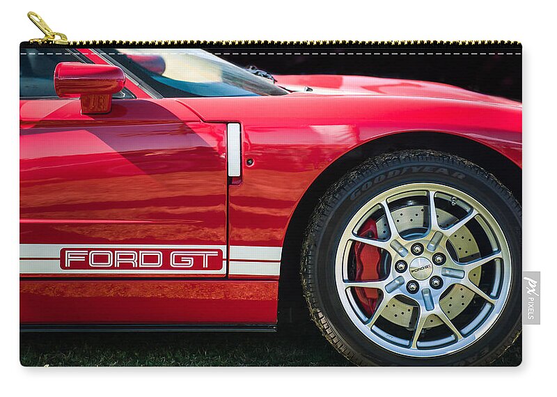 Ford Gt Side Emblem - Wheel Zip Pouch featuring the photograph Ford GT Side Emblem - Wheel -ck2352c by Jill Reger