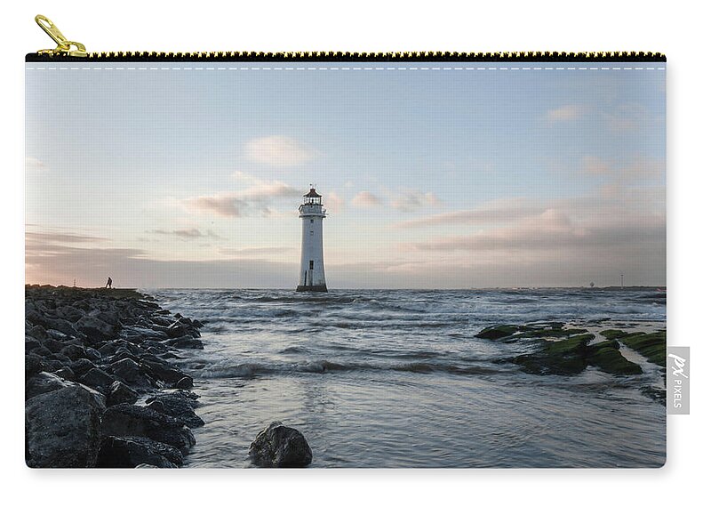 Beach Zip Pouch featuring the photograph Fort Perch Lighthouse in the Tide by Spikey Mouse Photography