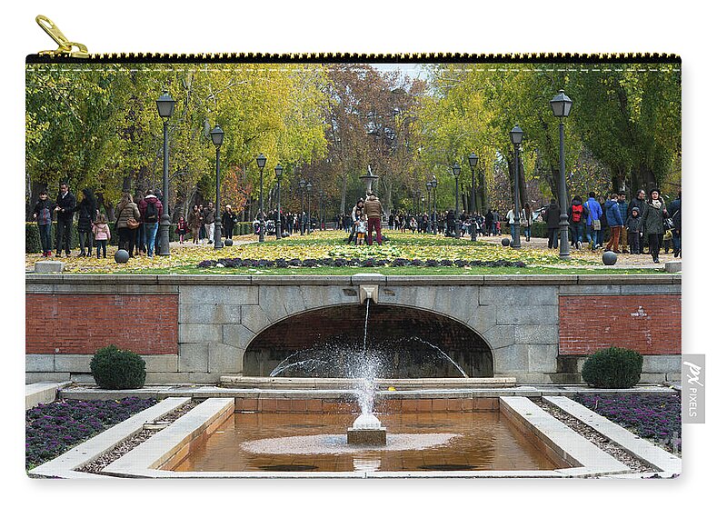 Capital Zip Pouch featuring the photograph fountain in Buen Retiro by Andrew Michael