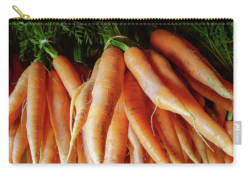 Carrot Zip Pouch featuring the photograph Fresh carrots from the summer garden by GoodMood Art