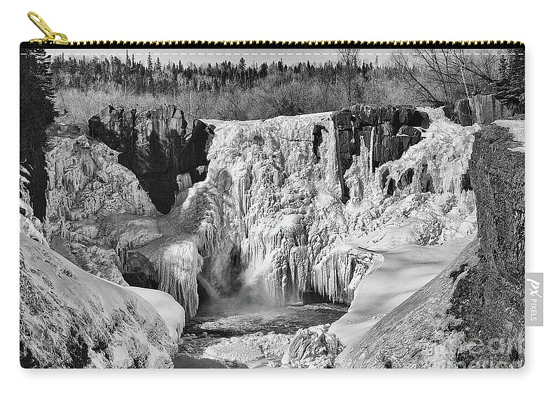 Grand Portage Zip Pouch featuring the photograph Frozen High Falls by CJ Benson