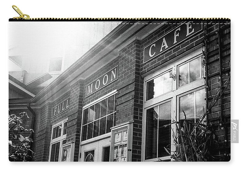 Manteo Zip Pouch featuring the photograph Full Moon Cafe by David Sutton