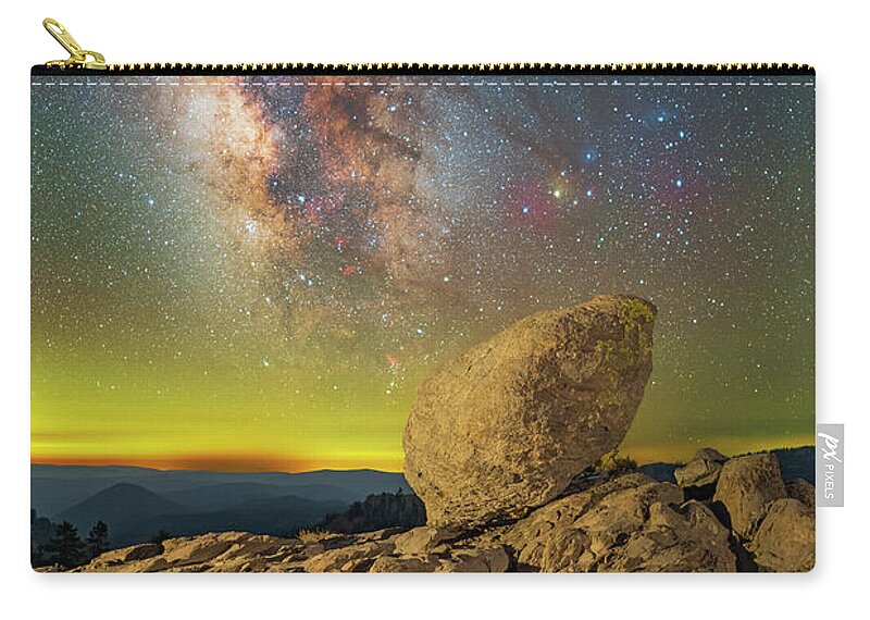 Astronomy Zip Pouch featuring the photograph Galactic Erratic by Ralf Rohner