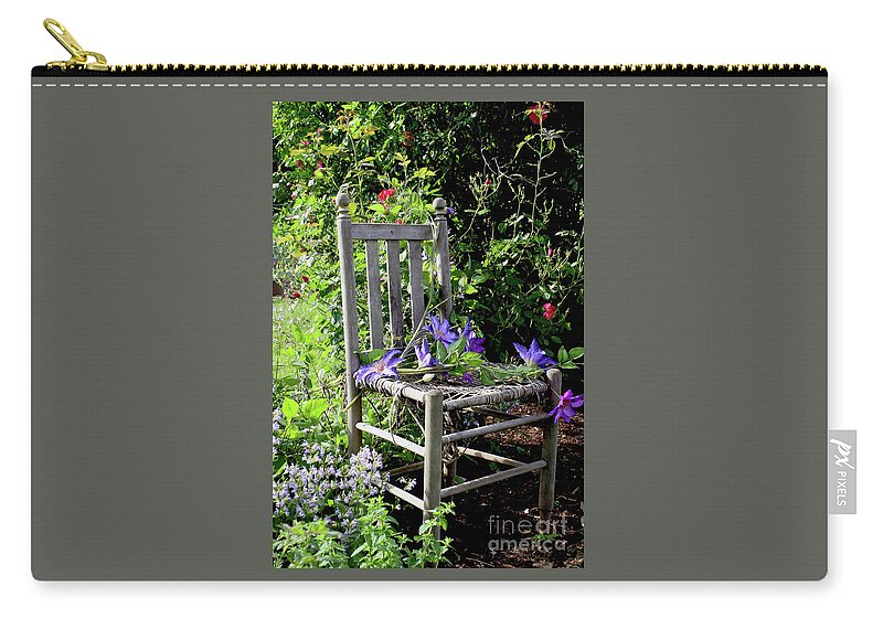 Garden Zip Pouch featuring the photograph Garden Chair by Paula Guttilla