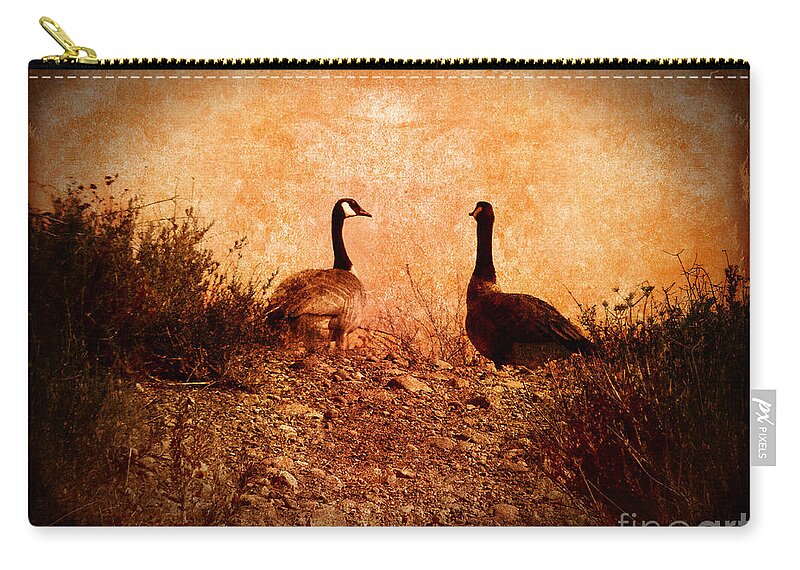 Nature Zip Pouch featuring the photograph Geese on a Hill by Laura Iverson