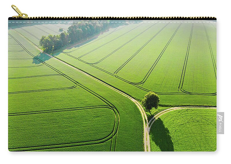 Green Landscape Zip Pouch featuring the photograph Geometric Landscape 04 Green fields aerial view by Matthias Hauser