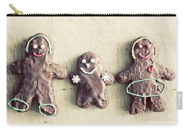 Gingerbread Zip Pouch featuring the photograph Gingerbread family by Michal Bednarek