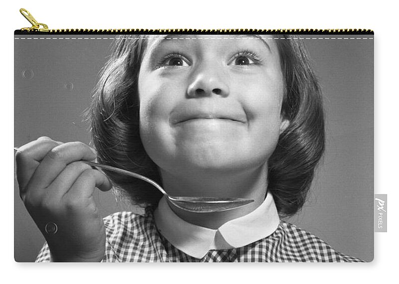 1960s Zip Pouch featuring the photograph Girl With Spoon Smiling, C.1960s by Debrocke/ClassicStock