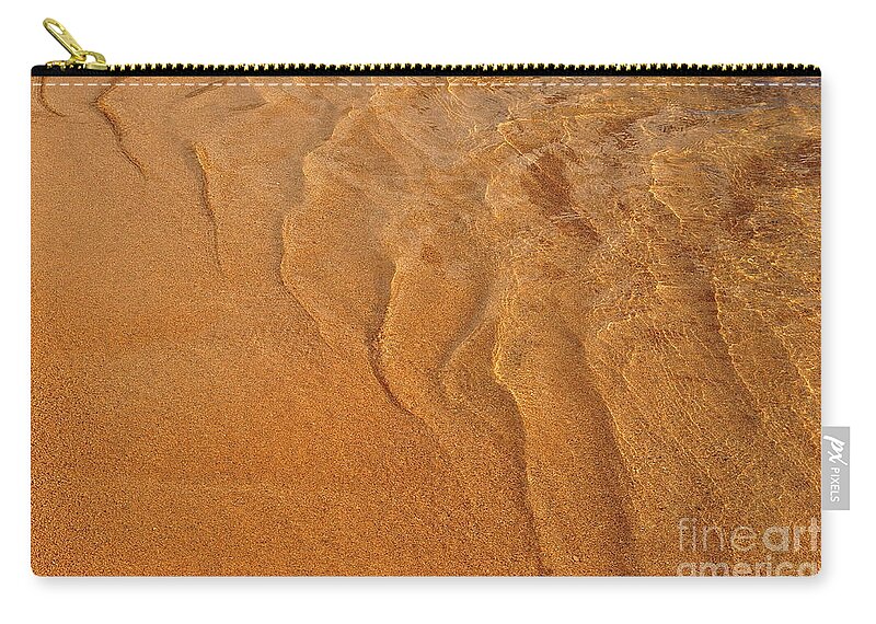 Water Zip Pouch featuring the photograph Golden Ripple by Sandra Sigfusson