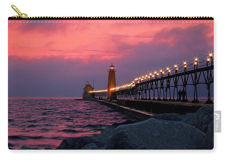 Grand Haven Zip Pouch featuring the photograph Grand Haven Sunset by Susan Rissi Tregoning
