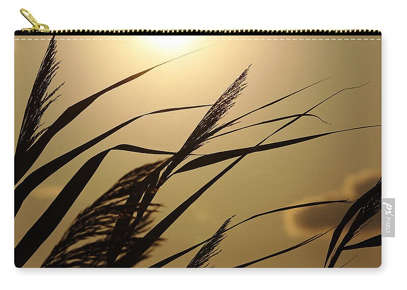 Sunset Zip Pouch featuring the photograph Grass In Silhouette by Debbie Oppermann