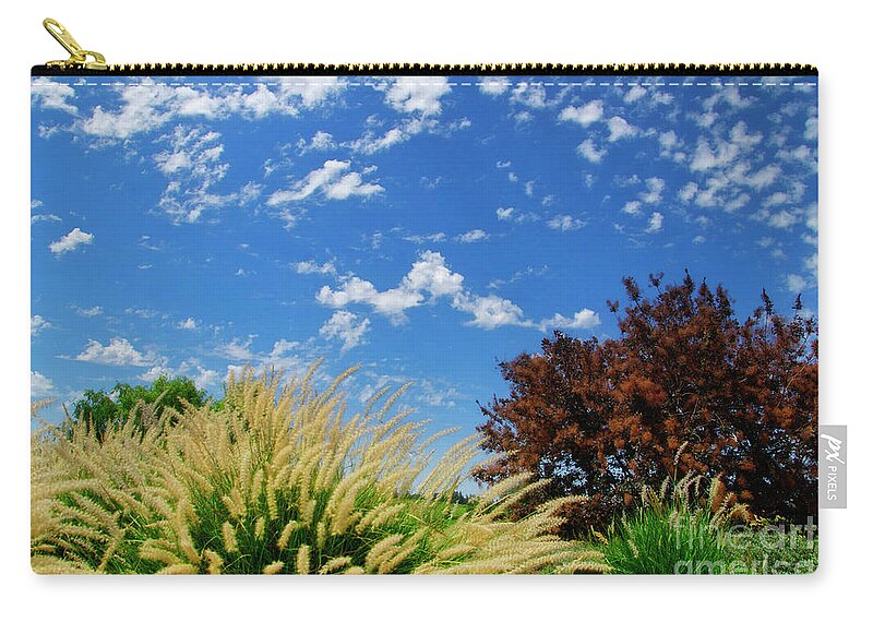 Cloud Zip Pouch featuring the photograph Grass in the clouds by Jim And Emily Bush