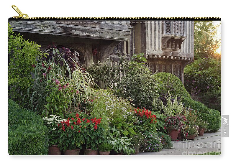 Sunset Carry-all Pouch featuring the photograph Great Dixter House and Gardens at Sunset 2 by Perry Rodriguez